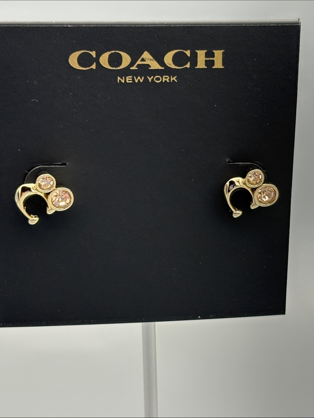 Coach Gold-Tone Crystal Accent Stud Earrings